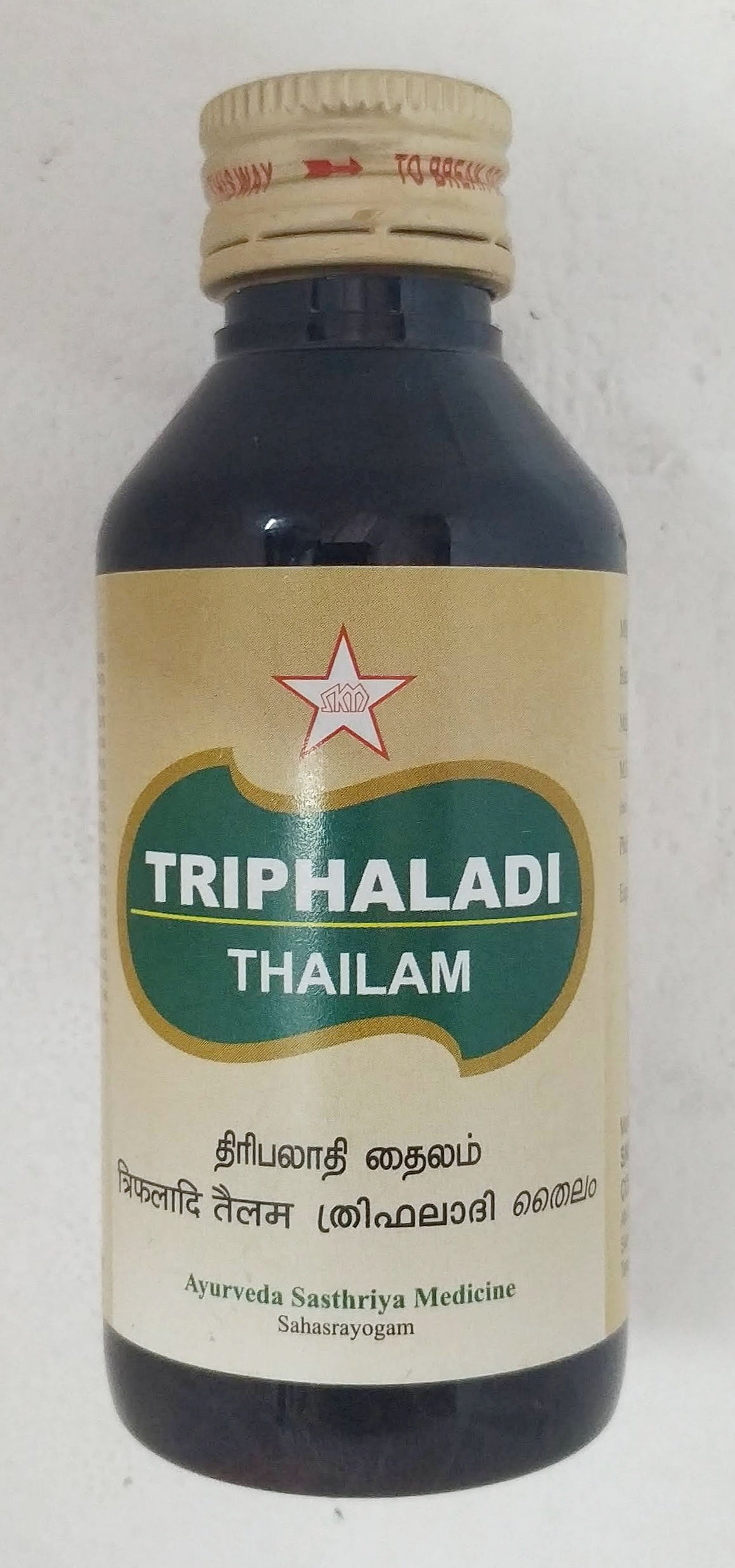 SKM Triphaladi Thailam 100ml -  SKM - Medizzo.com